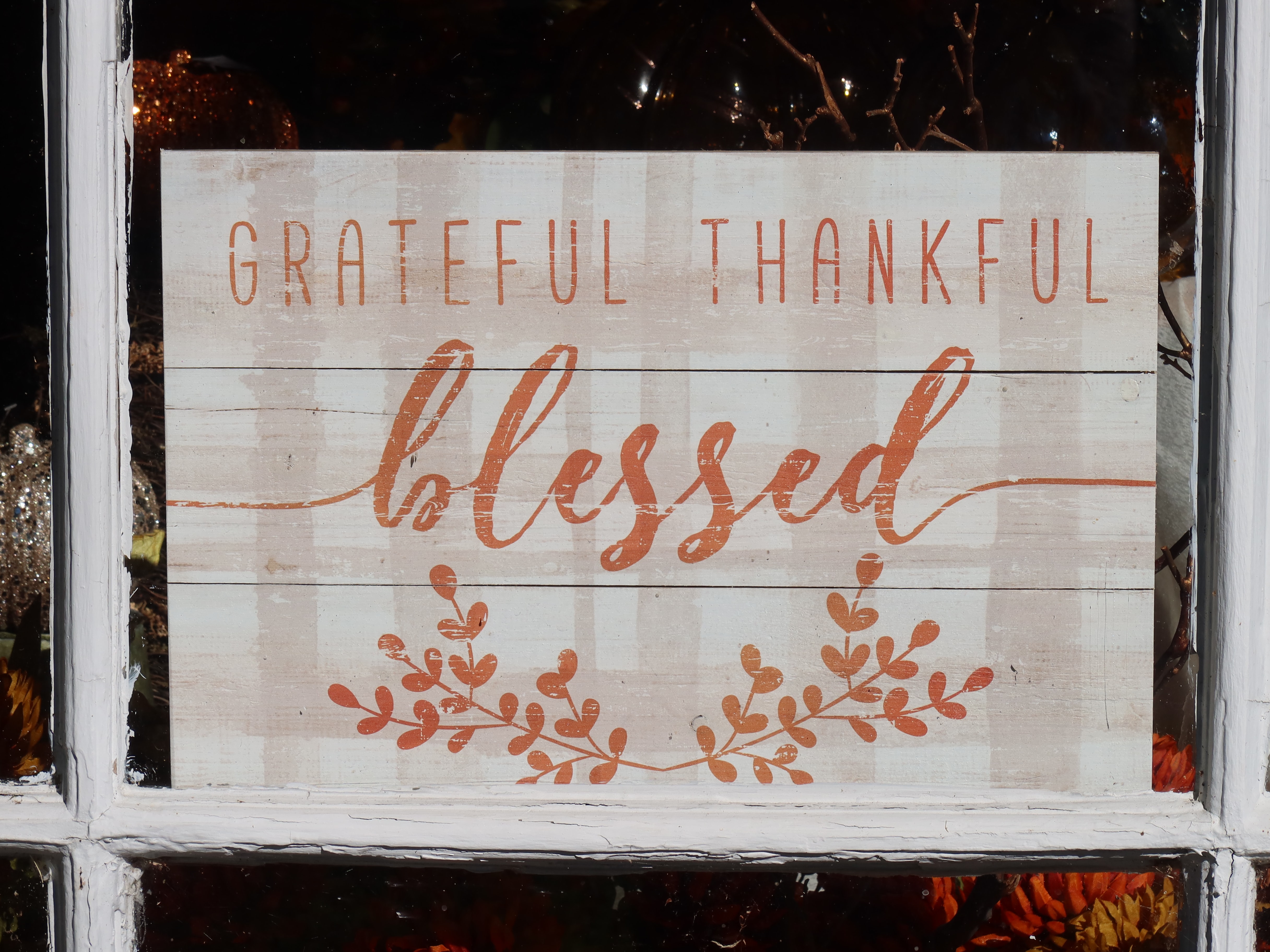 placard reading grateful thankful blessed